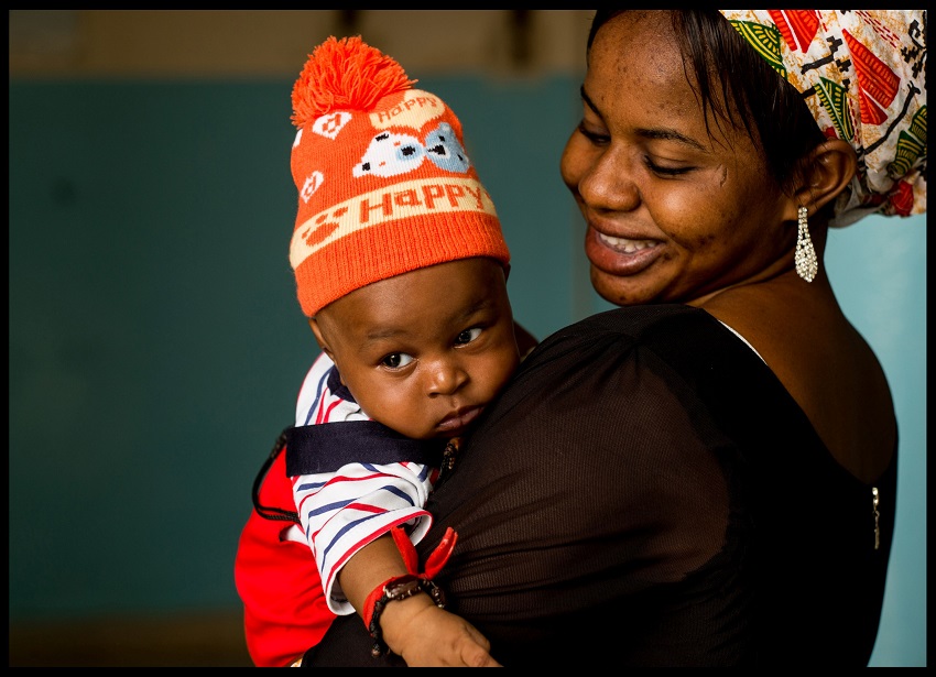 Image ©Licensed to i-Images Picture Agency. 09/08/2017. Matam, Senegal. Action Against Hunger- Senegal. Aiessatou Babou (brown Top) with her 2 month old child Oumara attending a nutrition class at the Matam Health Centre. Picture by Andrew Parsons / i-Images