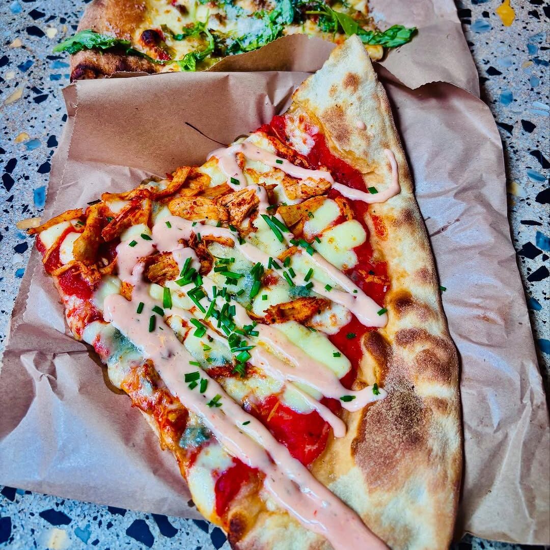 Free pizza slices with your pint for Marathon finishers