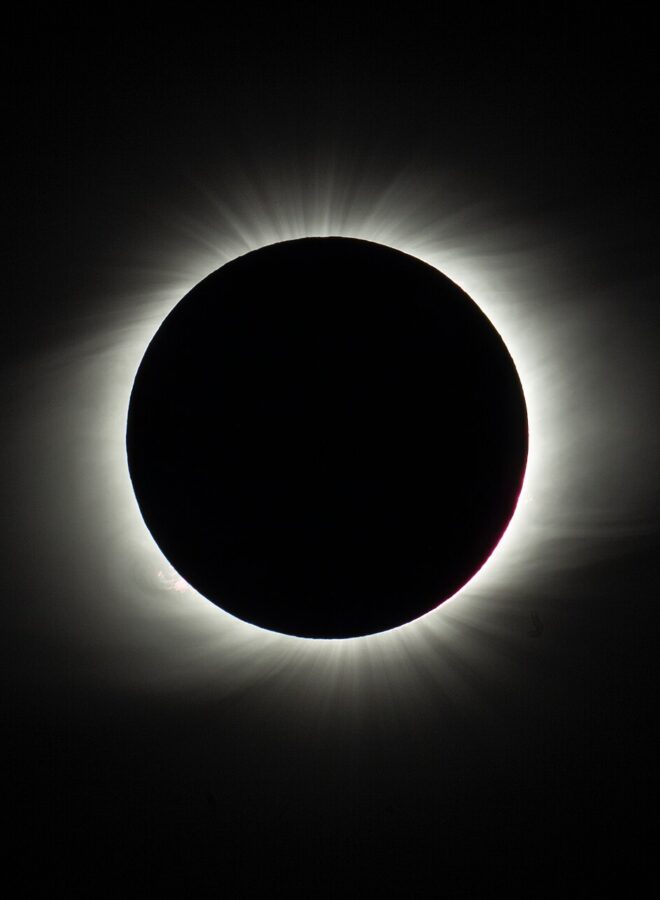 On 2 July 2019, a total solar eclipse passed over ESO’s La Silla Observatory in Chile. This image shows the Sun completely covered by the Moon during totality, revealing the solar corona, or the Sun's atmosphere. While totality only lasted about two minutes, the eclipse overall lasted over two hours and was visible across a narrow band of Chile and Argentina. To celebrate this rare event ESO invited 1000 people, including dignitaries, school children, the media, researchers, and the general public, to come to the Observatory to watch the eclipse from this unique location.